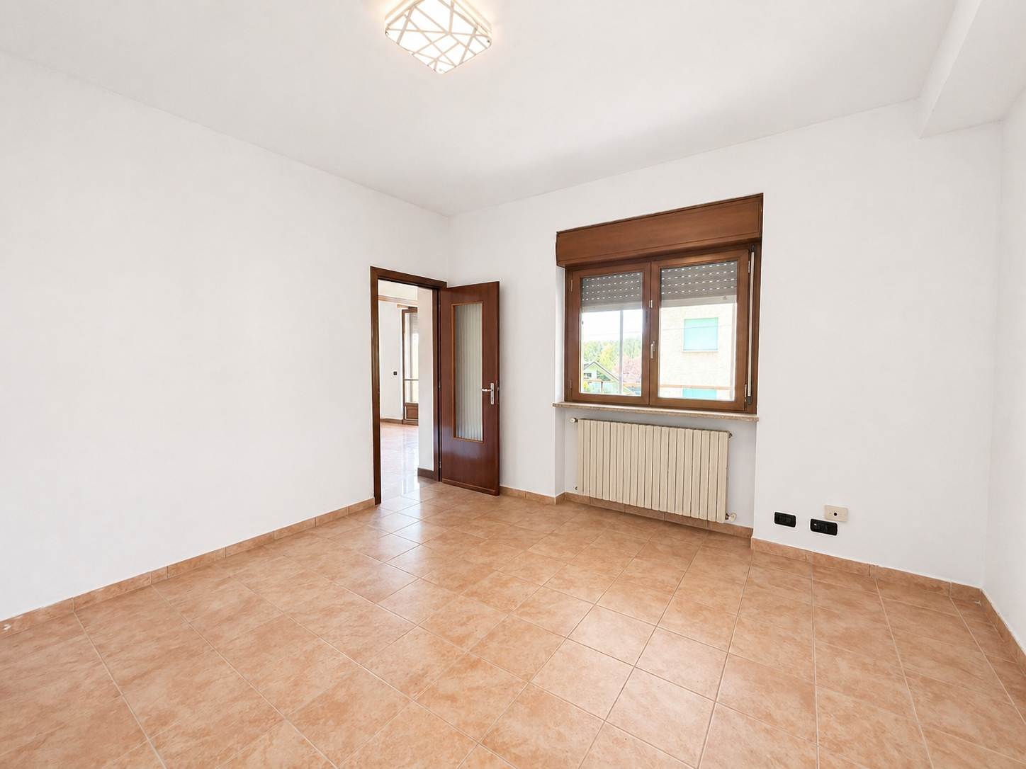 TRILOCALE CON TERRAZZO E BOX A CAPRIE