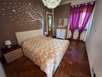 PORZIONE DI VILLA IN VENDITA A SANT’AMBROGIO CON GIARDINO E PISCINA